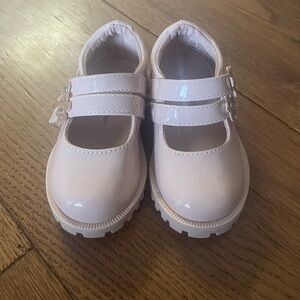 Beige comfy and cute toddler girl shoes.